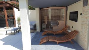 Area soggiorno di Villa Nostalgia pool & wellness