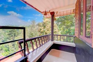 Balkón nebo terasa v ubytování Collection O Kunchithanny Road Munnar Formerly Indeevaram Resort
