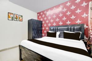 Super Hotel O Nehru Nagar Near Bus Stand客房内的一张或多张床位