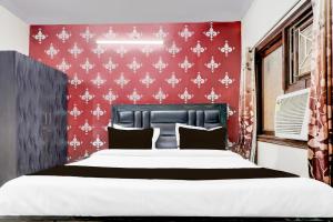 Super Hotel O Nehru Nagar Near Bus Stand客房内的一张或多张床位