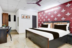 Super Hotel O Nehru Nagar Near Bus Stand客房内的一张或多张床位