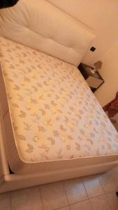 A bed or beds in a room at il Biscottino