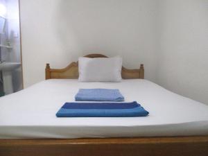 Rúm í herbergi á Forest Villa Nature Resort