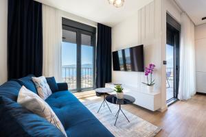 Μια τηλεόραση ή/και κέντρο ψυχαγωγίας στο Vista Per Te Apartments