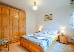 Posteľ alebo postele v izbe v ubytovaní Apartament Na Rozdrożu