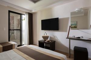 TV a/nebo společenská místnost v ubytování Hotel Rema