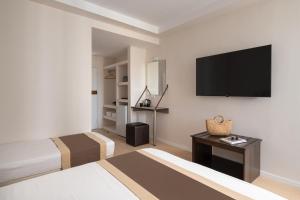 TV a/nebo společenská místnost v ubytování Hotel Rema
