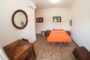 En eller flere senge i et værelse på Casa Pax - Habitación El Atardecer Dorado a Pasos del Mar + 12 billeder