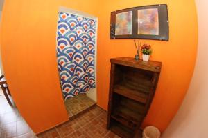 Et tv og/eller underholdning på Casa Pax - Habitación El Atardecer Dorado a Pasos del Mar