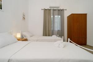 Letto o letti in una camera di Gima sis