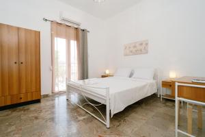 Letto o letti in una camera di Gima sis