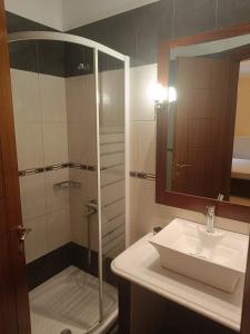 Kúpeľňa v ubytovaní Ενοικιαζόμενα Δωμάτια "Pelion Plaza"