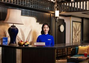 Členové personálu v ubytování Golden Amour Hotel