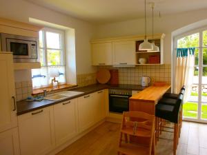 Kuchyň nebo kuchyňský kout v ubytování Nordstern Wlan Sauna Kamin Haustiere + 8 fotografií