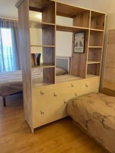Postel nebo postele na pokoji v ubytování Residenza Riva Wellness Apartment Spa