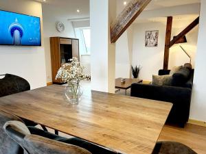 TV a/nebo společenská místnost v ubytování 3-Zimmerwohnung, 2 Bäder, Büsum (4km), Nordsee