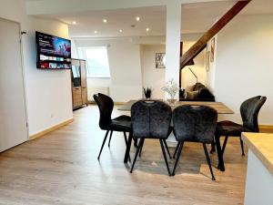 TV a/nebo společenská místnost v ubytování 3-Zimmerwohnung, 2 Bäder, Büsum (4km), Nordsee