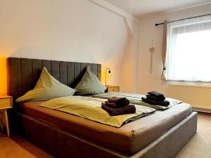 Postel nebo postele na pokoji v ubytování 3-Zimmerwohnung, 2 Bäder, Büsum (4km), Nordsee