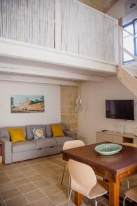 TV a/nebo společenská místnost v ubytování Corte Dei Saraceni