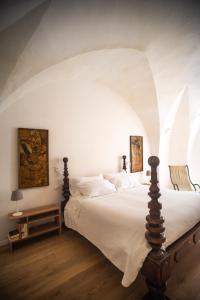 Postel nebo postele na pokoji v ubytování Corte Dei Saraceni