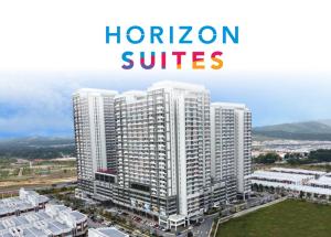 a large white building with the words h horizon suites at Horizon Staycation w WiFi in Sepang