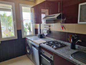 Kuchyň nebo kuchyňský kout v ubytování Residence Al Massira