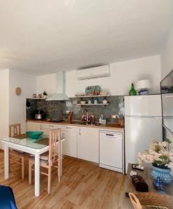 Kuchyň nebo kuchyňský kout v ubytování Estudio Azul