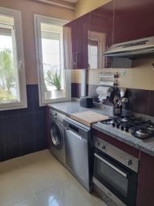 Kuchyň nebo kuchyňský kout v ubytování Residence Al Massira