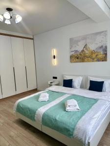 Ένα ή περισσότερα κρεβάτια σε δωμάτιο στο Ocean Breeze