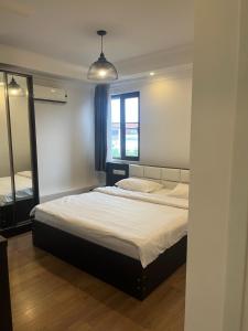 Giường trong phòng chung tại Guest House Gantiadi