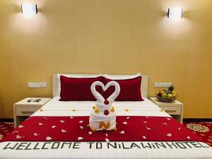 Postel nebo postele na pokoji v ubytování Nilawin Hotels & Resorts