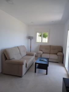 Posezení v ubytování ACAPULCO PLAYA 7 MENYBER