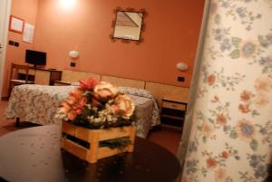 TV a/nebo společenská místnost v ubytování Albergo Sangrilà