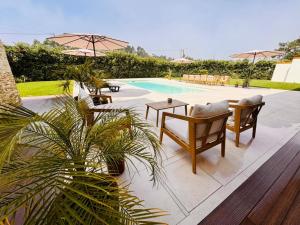 Piscina di Ria Lounge House o nelle vicinanze