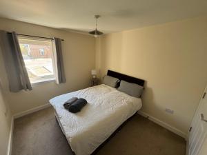 Postel nebo postele na pokoji v ubytování SAM Slains Drive