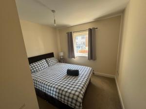 Postel nebo postele na pokoji v ubytování SAM Slains Drive