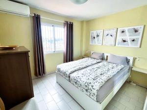 A bed or beds in a room at Casa Carlos