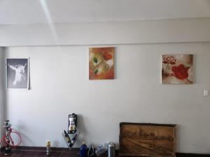 a kitchen with three pictures on the wall at Beautiful View House in Vosburg