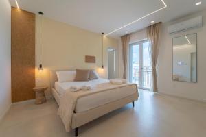 Postel nebo postele na pokoji v ubytování Sophora Guest House Alghero