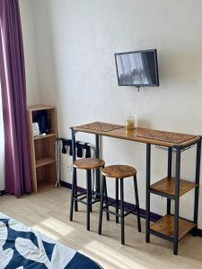 Μια τηλεόραση ή/και κέντρο ψυχαγωγίας στο L'Essentiel - Gare - Climatisation - Proche du centre