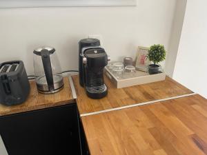 a coffee maker sitting on top of a counter at Bas de villa in Istres