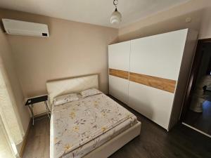 Postel nebo postele na pokoji v ubytování Botanic Park Apartments