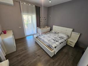 Postel nebo postele na pokoji v ubytování Botanic Park Apartments