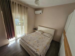 Postel nebo postele na pokoji v ubytování Botanic Park Apartments