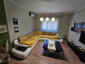 Posezení v ubytování Botanic Park Apartments