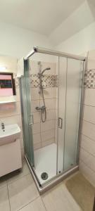Kúpeľňa v ubytovaní Joós Apartman