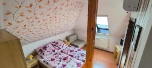 Posteľ alebo postele v izbe v ubytovaní Joós Apartman