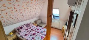 Posteľ alebo postele v izbe v ubytovaní Joós Apartman