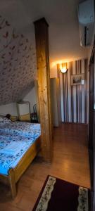 Posteľ alebo postele v izbe v ubytovaní Joós Apartman