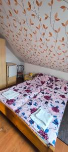 Posteľ alebo postele v izbe v ubytovaní Joós Apartman